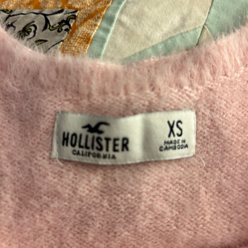 Pink, soft Hollister, tank top with daisies across the front XS